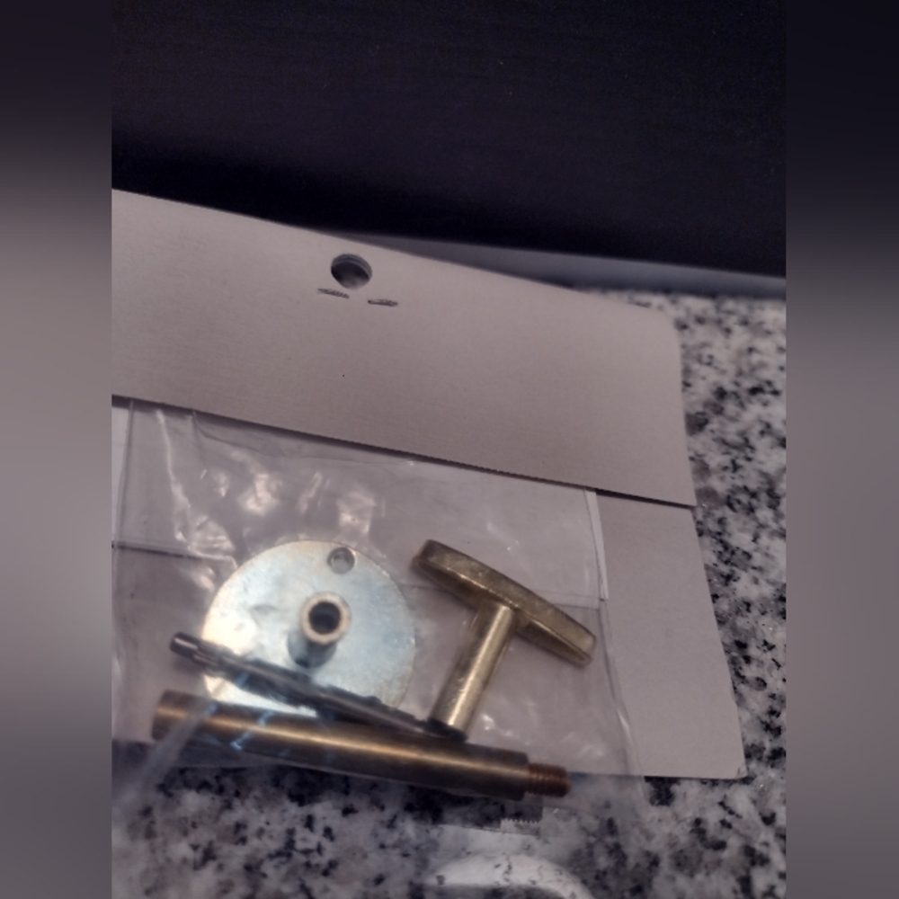 Replacement T-Bar Winding Key Kit for Sankyo Music Boxes. Includes four parts.